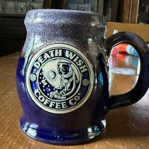 Death Wish Coffee Co. astronaut design. Blue Ceramic Mug